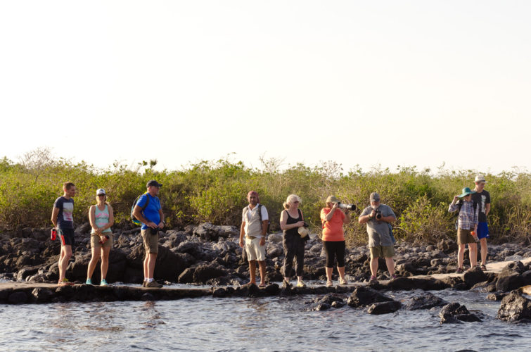 Tourists enjoying the heat of the Galapagos Islands