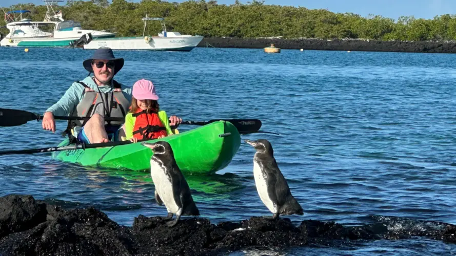 Family Travel in the Galapagos - Galapagos land tour - family kayak in tintoreras