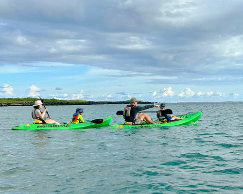Family kayaking in the Galapagos